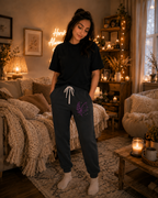 Fern & Flicker Joggers — Black Athletic Joggers with Purple Dragon Wing Plant Graphic